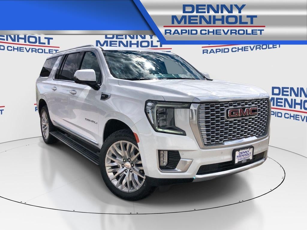2024 GMC Yukon XL Denali in Summit White — front three-quarter view
