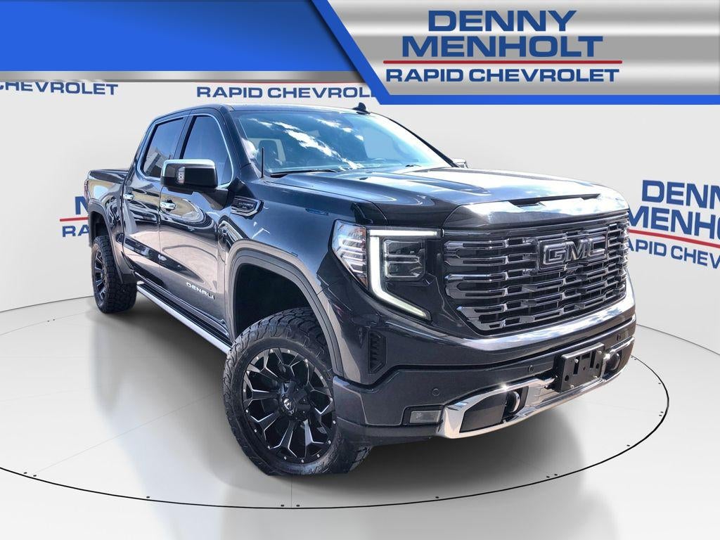 2024 GMC Sierra 1500 Denali Ultimate in Titanium Rush Metallic — front three-quarter view