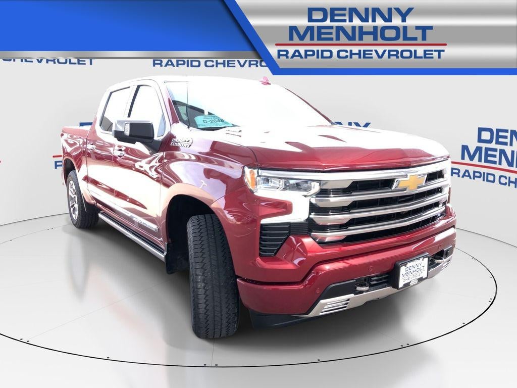 2025 Chevrolet Silverado 1500 High Country in Radiant Red Tintcoat — front three-quarter view